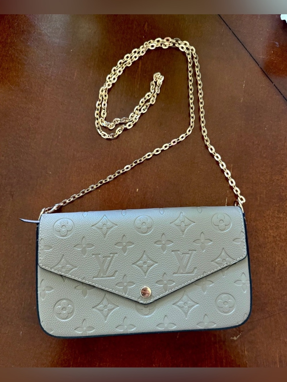 Cute tan crossbody bag with gold chain